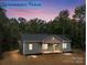 Charming home exterior with inviting front porch set against a dusk sky at 317 N Cemetery St, Richfield, NC 28137