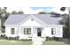 Charming one-story home featuring a covered front porch, gray roof, and simple, yet elegant design at 317 N Cemetery St, Richfield, NC 28137