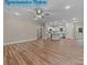 Spacious living room features hardwood floors that flows into the kitchen at 317 N Cemetery St, Richfield, NC 28137