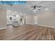 Expansive living area features hardwood floors seamlessly connected to the kitchen, great for entertaining at 317 N Cemetery St, Richfield, NC 28137