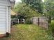 Backyard with wood fence, and a peek at the back deck, perfect for outdoor gatherings at 3500 Blessing St, Charlotte, NC 28208