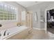 Luxurious bathroom features a soaking tub and a glass enclosed shower at 362 Windell Dr # 67, Fort Mill, SC 29708