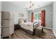 Cozy bedroom with wood-look floors and a neutral color scheme at 362 Windell Dr # 67, Fort Mill, SC 29708