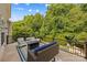 Deck features outdoor seating, fire pit, and beautiful green tree view at 362 Windell Dr # 67, Fort Mill, SC 29708