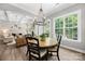 Cozy dining room with natural light, hardwood floors, and views into the living room at 362 Windell Dr # 67, Fort Mill, SC 29708
