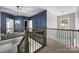 Upper hallway with beautiful wood and wrought iron railing at 362 Windell Dr # 67, Fort Mill, SC 29708