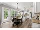 Bright kitchen featuring stainless steel appliances, granite countertops, an island, and a large window for natural light at 362 Windell Dr # 67, Fort Mill, SC 29708