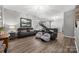 Spacious living room with hardwood floors, comfortable seating, and modern lighting at 362 Windell Dr # 67, Fort Mill, SC 29708