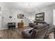 Beautiful living room with hardwood floors and comfortable gray sofas at 362 Windell Dr # 67, Fort Mill, SC 29708