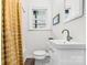 Well-lit bathroom with shower, toilet, and a modern sink and vanity at 3726 The Plaza None, Charlotte, NC 28205
