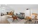 Inviting living room with comfortable seating, stylish rug, and hardwood floors at 3726 The Plaza None, Charlotte, NC 28205