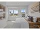 Bright bedroom with neutral tones, carpet flooring, and natural light from the window at 3737 S Tryon St, Charlotte, NC 28217