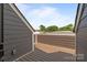 Private deck area with wood-look flooring at 3737 S Tryon St, Charlotte, NC 28217