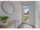 Bright entryway with sleek floors, complemented by stylish decor and a welcoming ambiance at 3737 S Tryon St, Charlotte, NC 28217