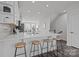 Elegant kitchen featuring a quartz countertop, stainless appliances, and a functional breakfast bar at 3737 S Tryon St, Charlotte, NC 28217
