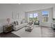 Inviting living room featuring neutral tones, ample natural light, and stylish furnishings at 3737 S Tryon St, Charlotte, NC 28217