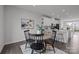 Elegant dining space blending seamlessly with a modern kitchen and an open-concept design at 3737 S Tryon St, Charlotte, NC 28217