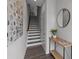 Welcoming foyer area featuring a staircase with a modern design and stylish decorations at 3737 S Tryon St, Charlotte, NC 28217