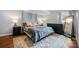 Comfortable bedroom with a soft rug, neutral tones, and ample natural light at 4044 Somerdale Ln, Charlotte, NC 28205
