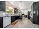 Practical kitchen with classic appliances, abundant cabinets, and a cozy eat-in breakfast bar at 4044 Somerdale Ln, Charlotte, NC 28205