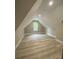 Attic bedroom featuring recessed lighting, wood flooring, and a window at 4435 Cornett Dr # 30, Iron Station, NC 28080