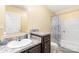 Bathroom featuring a single sink and dark cabinets with a shower and tub combo at 4518 Logging Rd, Lancaster, SC 29720