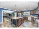 Bright kitchen with stainless steel appliances, a center island, and an open layout at 4518 Logging Rd, Lancaster, SC 29720