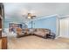 A cozy living room featuring a comfortable sectional sofa and open access to the kitchen at 4518 Logging Rd, Lancaster, SC 29720