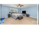 Comfortable main bedroom with a ceiling fan, neutral carpet, and ample natural light at 4518 Logging Rd, Lancaster, SC 29720