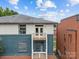 Exterior view showcasing balconies and the blend of brick and siding at 482 New Bern Station Ct, Charlotte, NC 28209