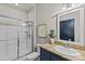 Well-lit bathroom showcasing shower, vanity, and a granite countertop at 482 New Bern Station Ct, Charlotte, NC 28209