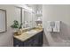 Stylish bathroom features granite countertops and ample storage space at 482 New Bern Station Ct, Charlotte, NC 28209