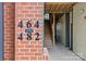 Building address numbers are visible next to the covered outdoor staircase at 482 New Bern Station Ct, Charlotte, NC 28209