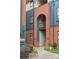 Exterior view of a brick building entrance and sidewalk at 482 New Bern Station Ct, Charlotte, NC 28209