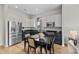 Bright kitchen featuring stainless steel appliances, two-tone cabinetry, and a modern design perfect for cooking and entertaining at 482 New Bern Station Ct, Charlotte, NC 28209
