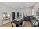 Kitchen with stainless steel appliances, two-tone cabinetry, and sleek countertops at 482 New Bern Station Ct, Charlotte, NC 28209