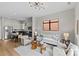 Open floor plan combines the living room and kitchen with hardwood floors at 482 New Bern Station Ct, Charlotte, NC 28209