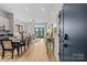 Open-concept living space with modern decor, hardwood floors, and plenty of natural light at 482 New Bern Station Ct, Charlotte, NC 28209