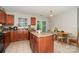 Modern kitchen featuring an island, and a sliding door to outside at 4837 Autumn Oak Dr, Charlotte, NC 28269