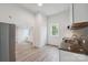 Spacious kitchen featuring stainless steel appliances, ample storage and light wood flooring at 506 N Styers St, Cherryville, NC 28021