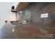 Close up of kitchen counter featuring a stainless steel sink, faucet and designer back splash at 506 N Styers St, Cherryville, NC 28021