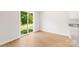 Dining Area with sliding doors and natural light adjacent to the kitchen area at 668 Lamorak Pl, Richburg, SC 29729
