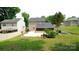 Spacious backyard featuring a patio and screened-in porch, perfect for outdoor entertaining at 7046 Dorn Cir, Charlotte, NC 28212