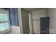 Half bath with decorative wallpaper and a shower/tub at 804 N Main St, Oakboro, NC 28129