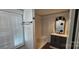 Full bathroom with modern vanity, shower, and laundry machines at 804 N Main St, Oakboro, NC 28129