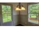 Dining area featuring modern lighting, neutral paint and natural light at 804 N Main St, Oakboro, NC 28129