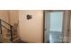 Foyer featuring staircase, wood-look walls, and entrance to a room at 804 N Main St, Oakboro, NC 28129