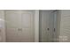Hallway shows closet doors and utility access at 804 N Main St, Oakboro, NC 28129