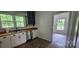 Modern kitchen featuring butcher block counters, stainless steel appliances and natural light at 804 N Main St, Oakboro, NC 28129