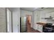 Updated kitchen featuring stainless steel appliances, butcher block counters and ample storage space at 804 N Main St, Oakboro, NC 28129